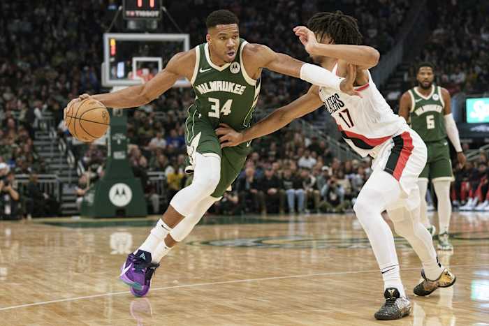 Milwaukee Bucks forward Giannis Antetokounmpo (34) drives for the basket against Portland Trail Blazers guard Shaedon Sharpe (17)